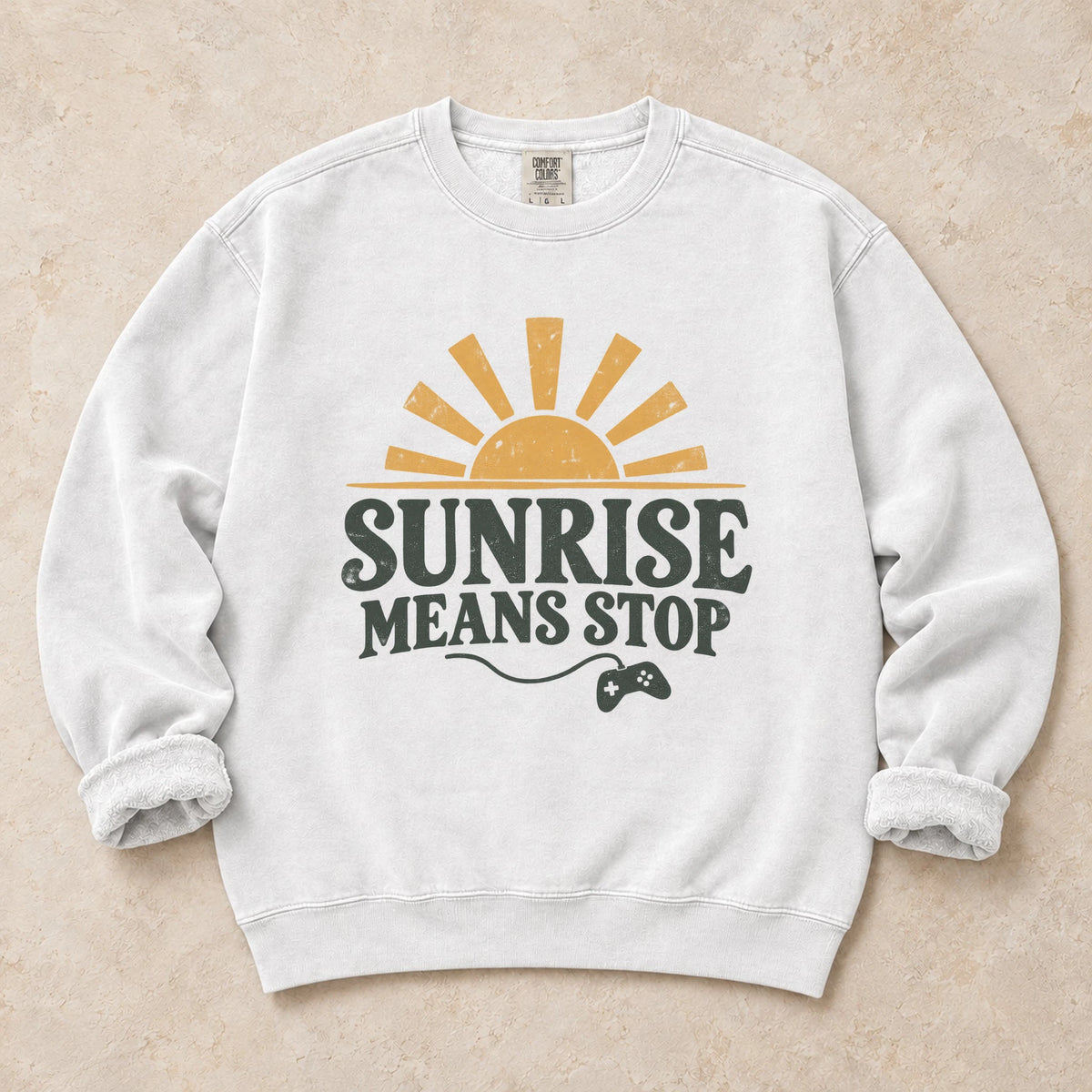 White gaming sweatshirt. A rising sun and controller remind night gamers that sunrise means stop.