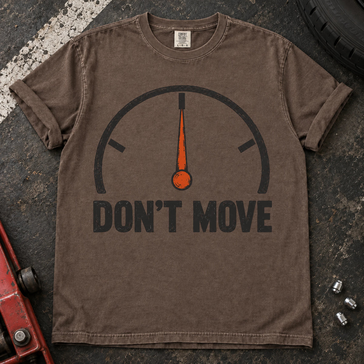 Espresso car enthusiast T-shirt. A temperature gauge stays centered under the hopeful instruction, don't move.