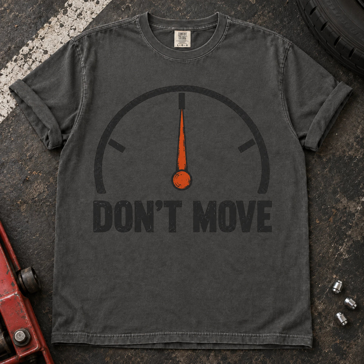 Pepper car enthusiast T-shirt. A temperature gauge stays centered under the hopeful instruction, don't move.