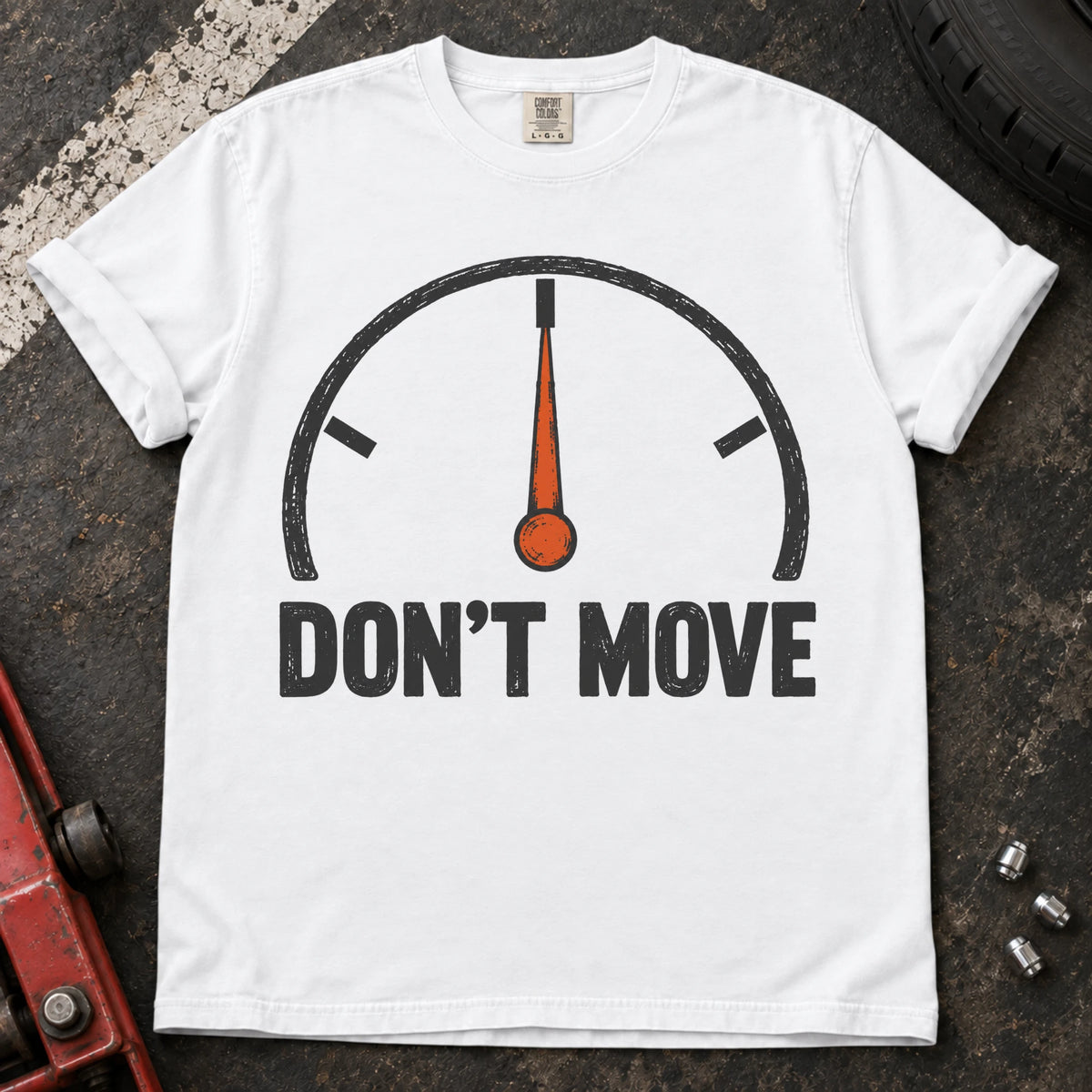 White car enthusiast T-shirt. A temperature gauge stays centered under the hopeful instruction, don't move.