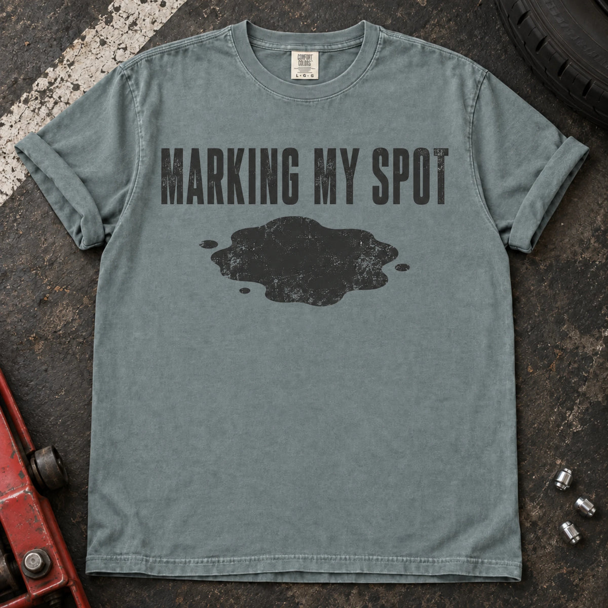 Bay car enthusiast T-shirt. An oil puddle gives marking my spot a car-owner twist.