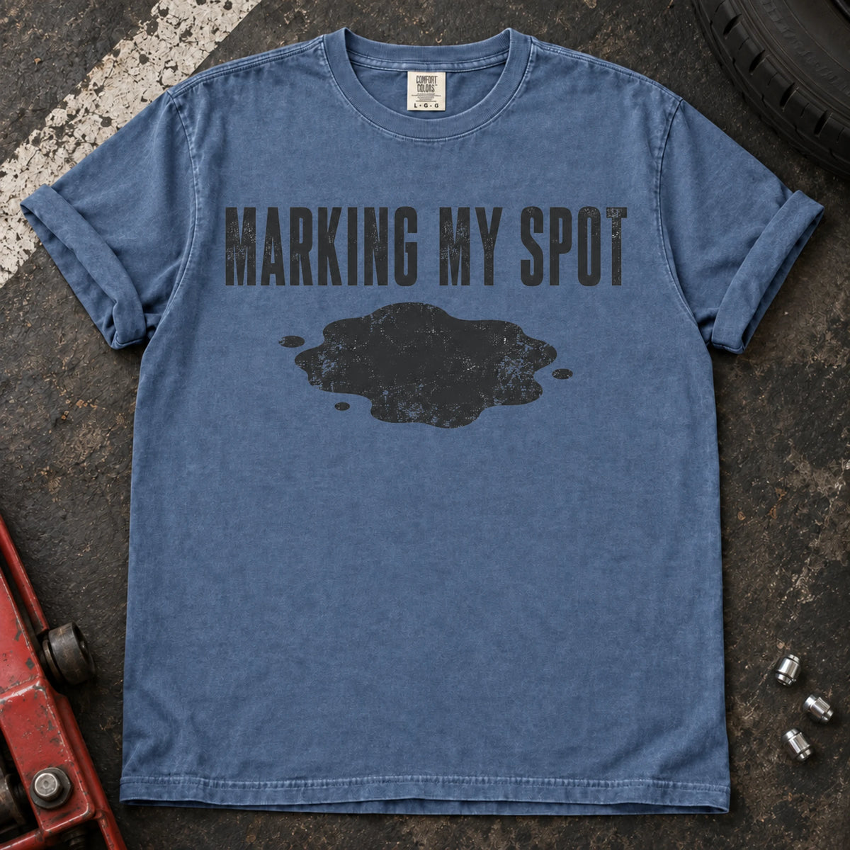 Blue Jean car enthusiast T-shirt. An oil puddle gives marking my spot a car-owner twist.