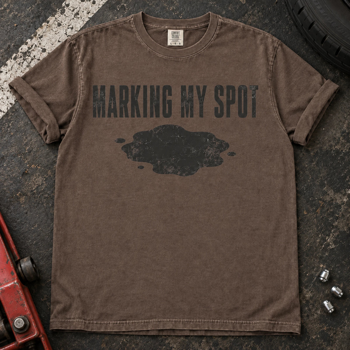 Espresso car enthusiast T-shirt. An oil puddle gives marking my spot a car-owner twist.