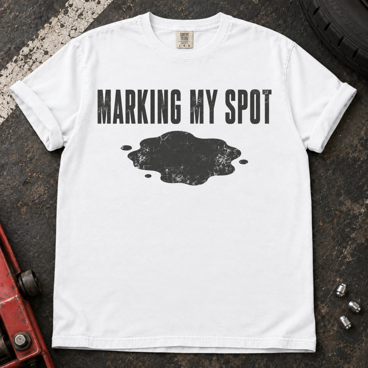 White car enthusiast T-shirt. An oil puddle gives marking my spot a car-owner twist.