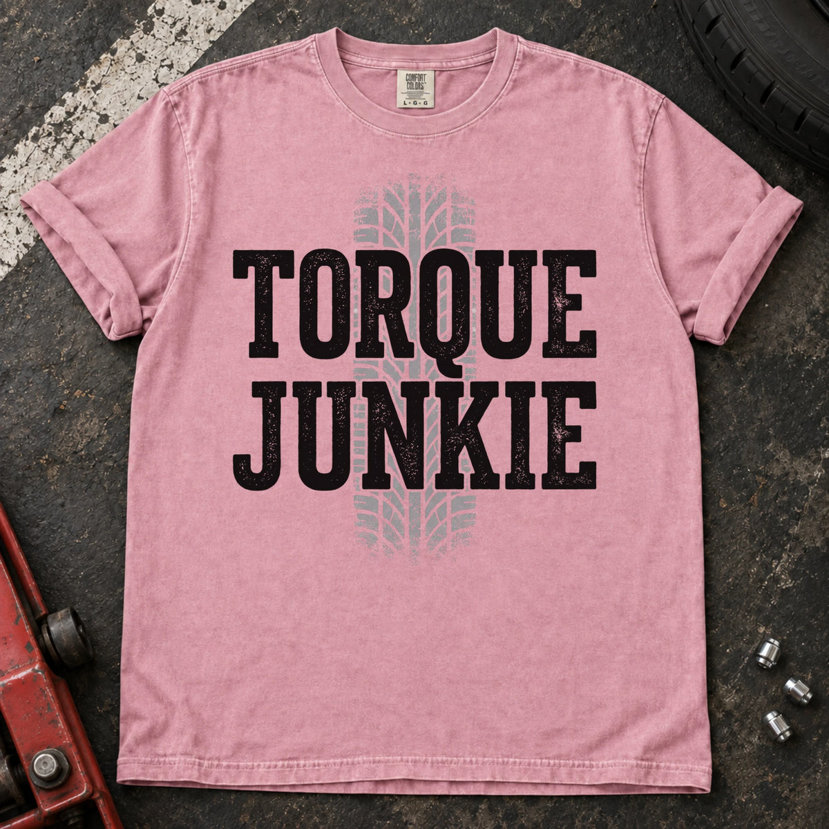 Blossom car enthusiast T-shirt. A tire-tread stripe backs bold Torque Junkie lettering.
