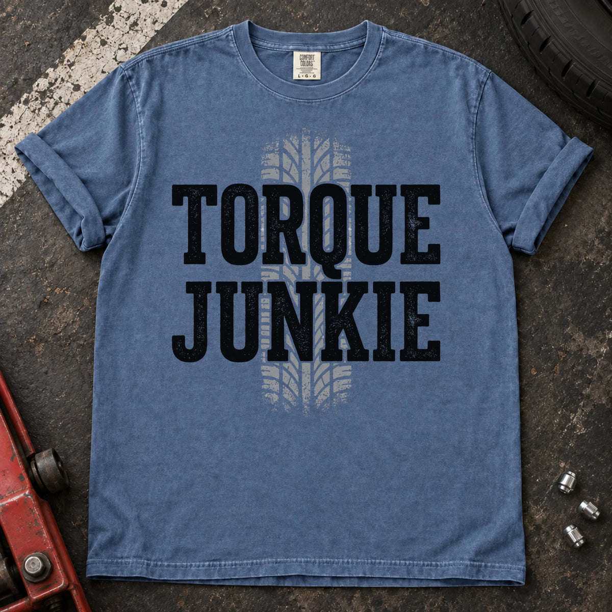 Blue Jean car enthusiast T-shirt. A tire-tread stripe backs bold Torque Junkie lettering.