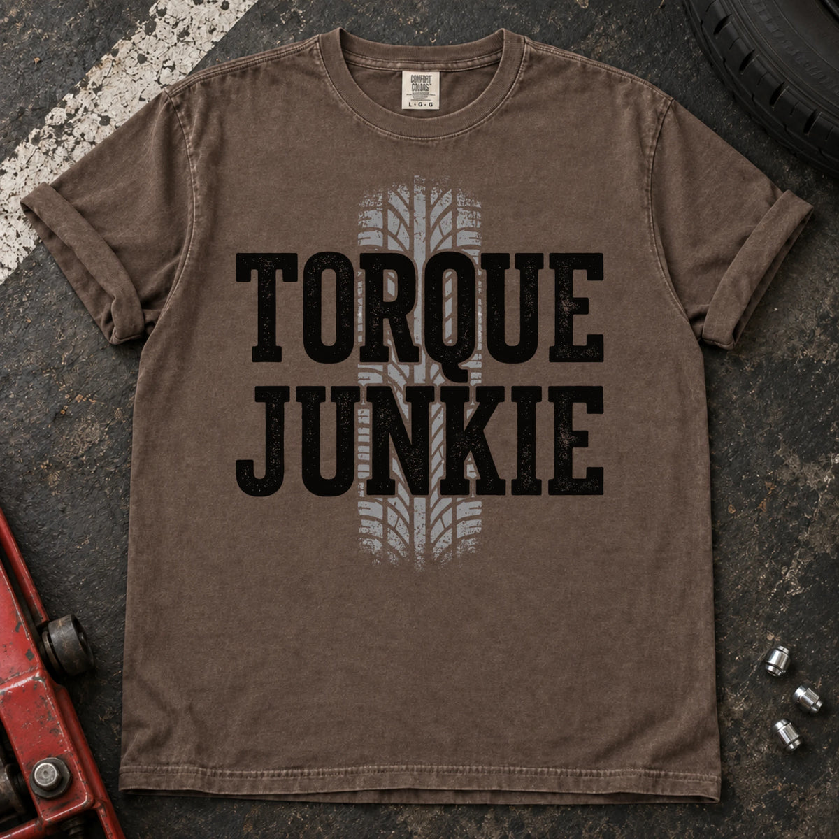 Espresso car enthusiast T-shirt. A tire-tread stripe backs bold Torque Junkie lettering.