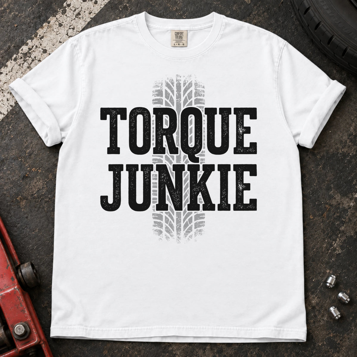 White car enthusiast T-shirt. A tire-tread stripe backs bold Torque Junkie lettering.