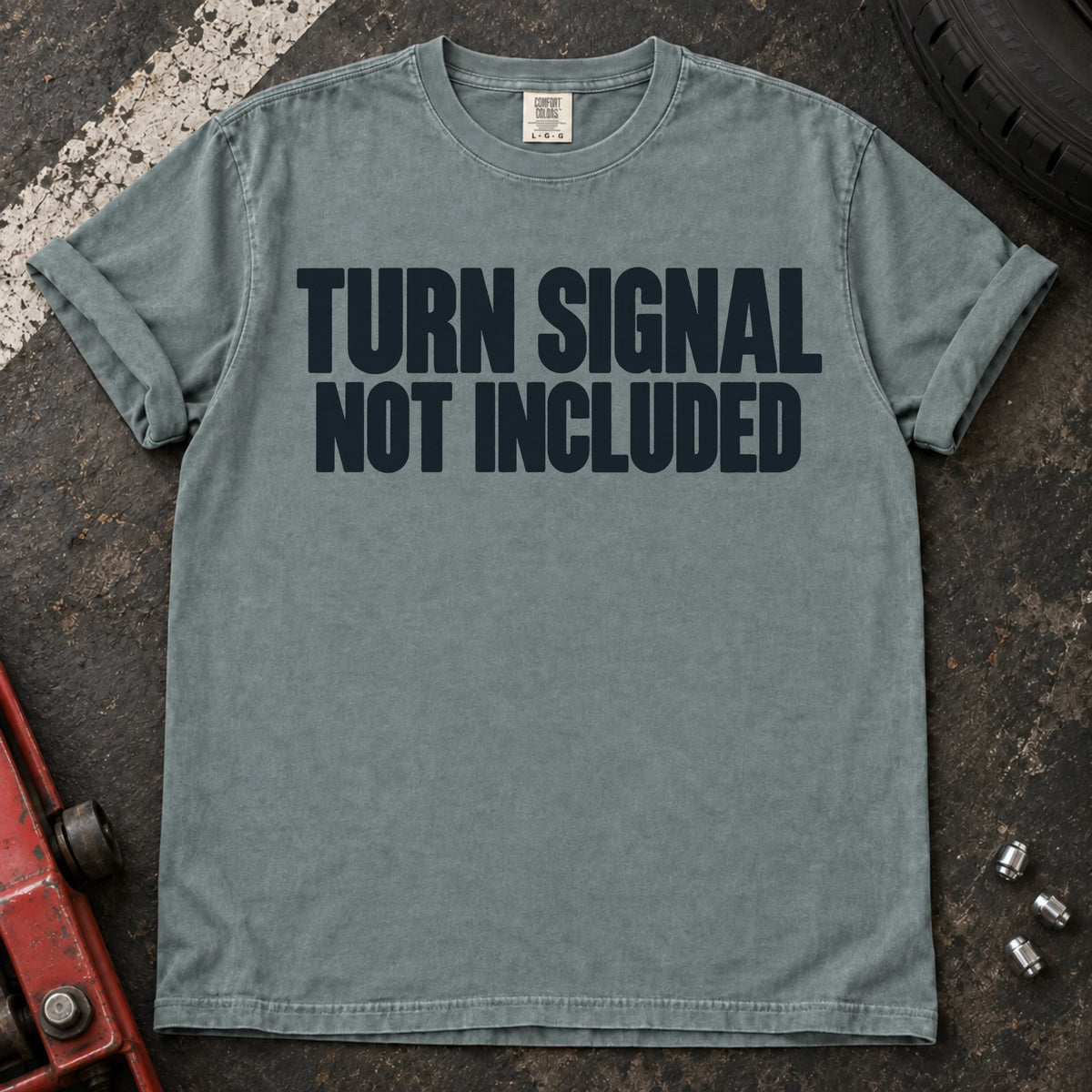 Bay car enthusiast T-shirt. Turn signal not included: a deadpan automotive typography joke.