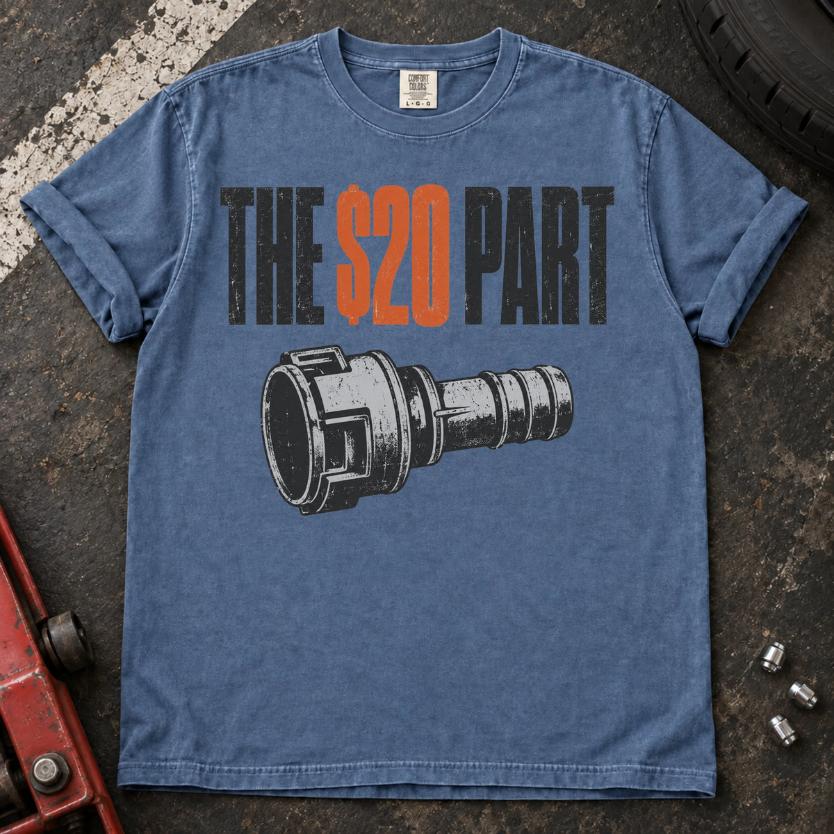 Blue Jean car enthusiast T-shirt. A small mechanical connector symbolizes the hoped-for twenty-dollar part.