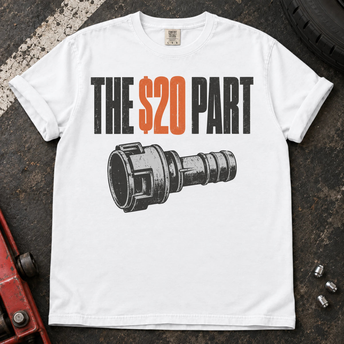 White car enthusiast T-shirt. A small mechanical connector symbolizes the hoped-for twenty-dollar part.