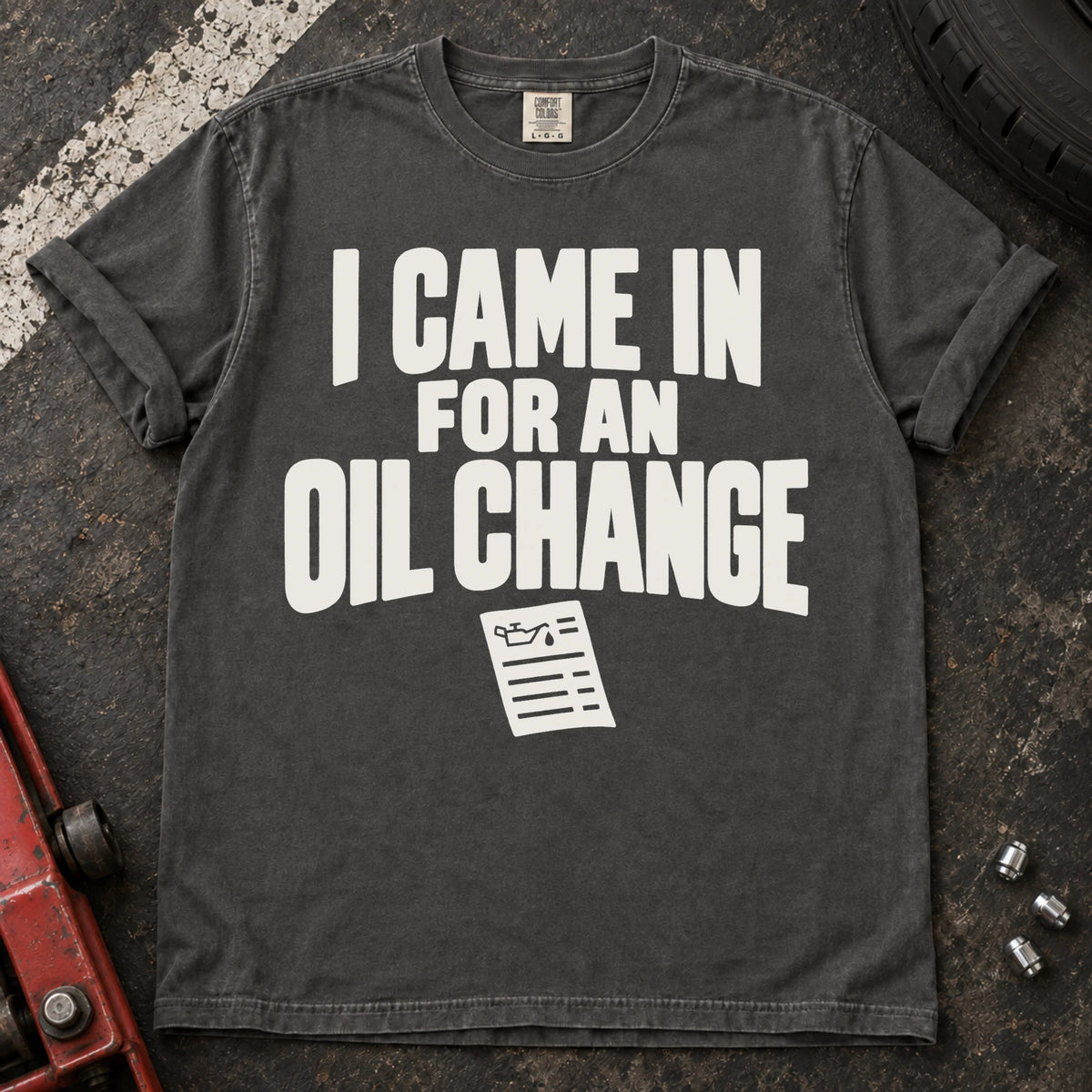Pepper T-shirt reading 'I came in for an oil change' above a small service invoice.