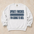 White gaming sweatshirt. A completed loading bar signals update finished, I'm going to bed.