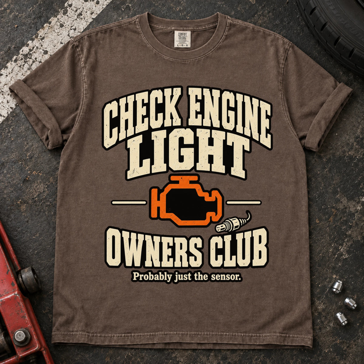 Espresso car enthusiast T-shirt. A warning-light badge welcomes the Check Engine Light Owners Club.