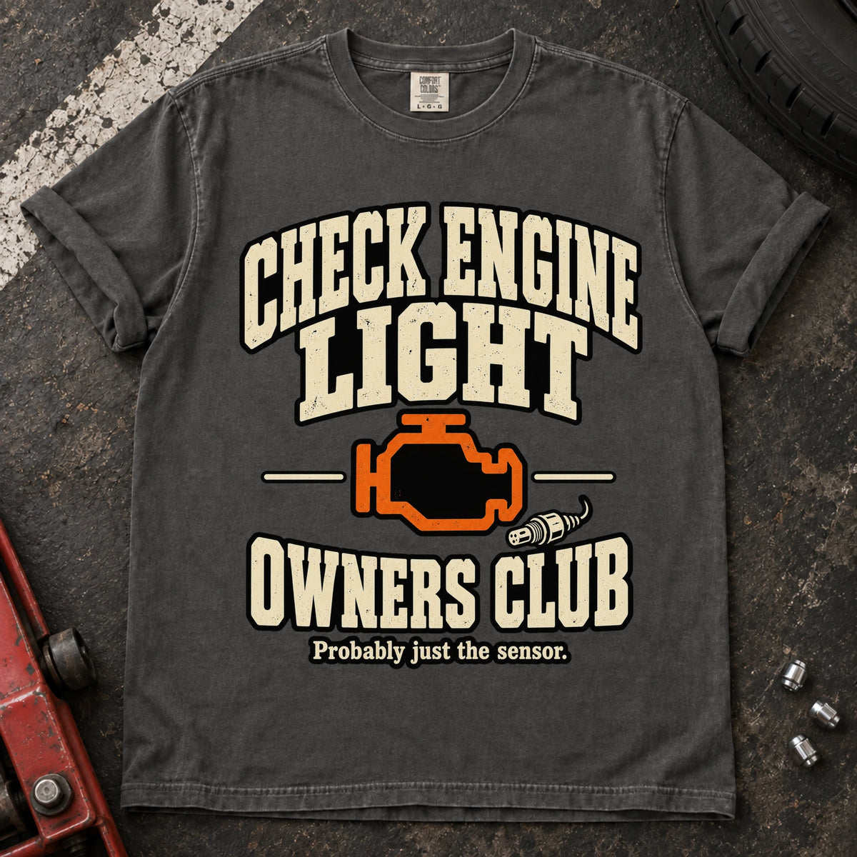Pepper car enthusiast T-shirt. A warning-light badge welcomes the Check Engine Light Owners Club.