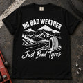 Black car enthusiast T-shirt. A rainy mountain road and tire explain no bad weather, just bad tyres.
