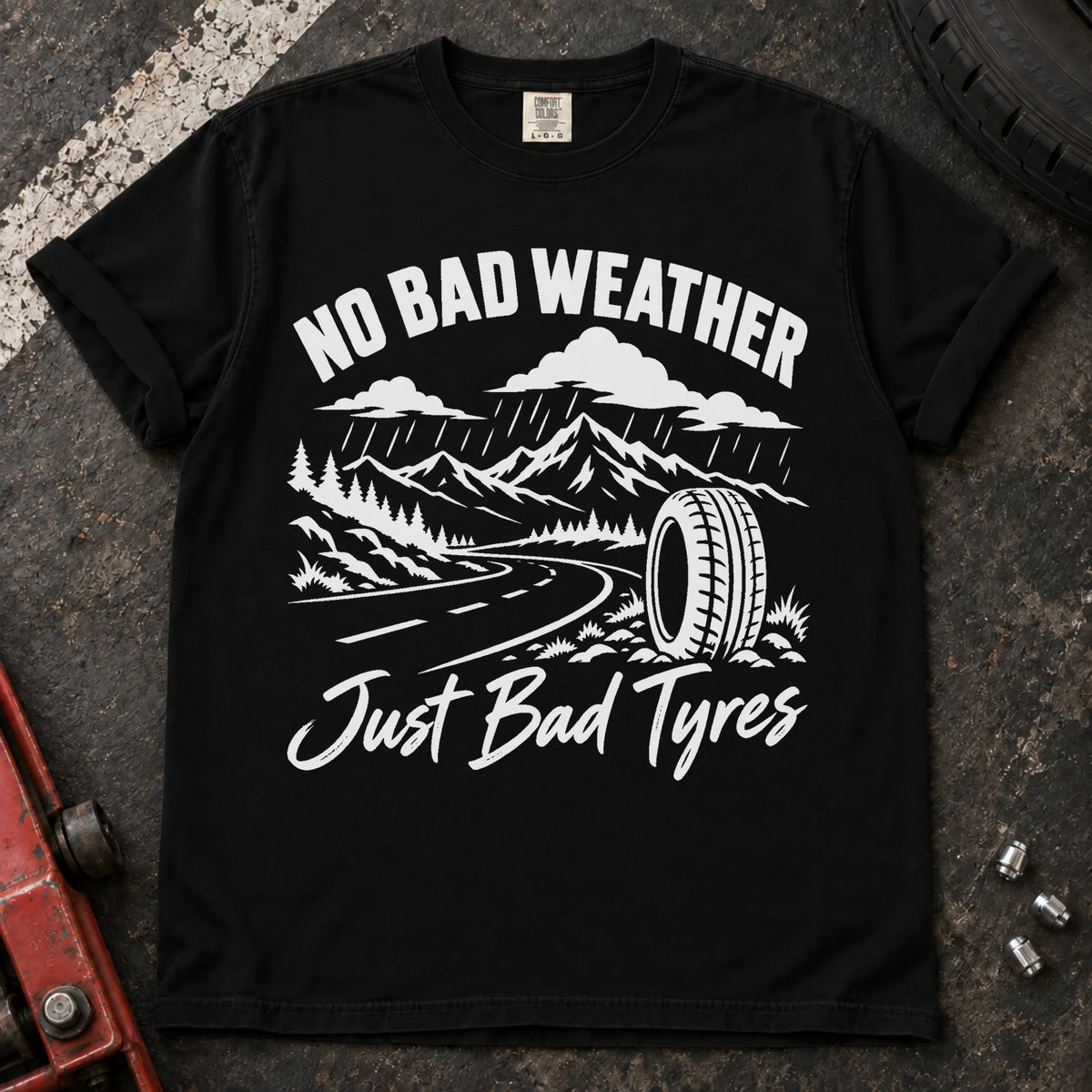 Black car enthusiast T-shirt. A rainy mountain road and tire explain no bad weather, just bad tyres.
