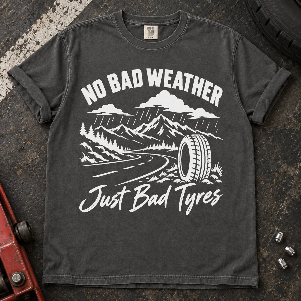 Pepper car enthusiast T-shirt. A rainy mountain road and tire explain no bad weather, just bad tyres.