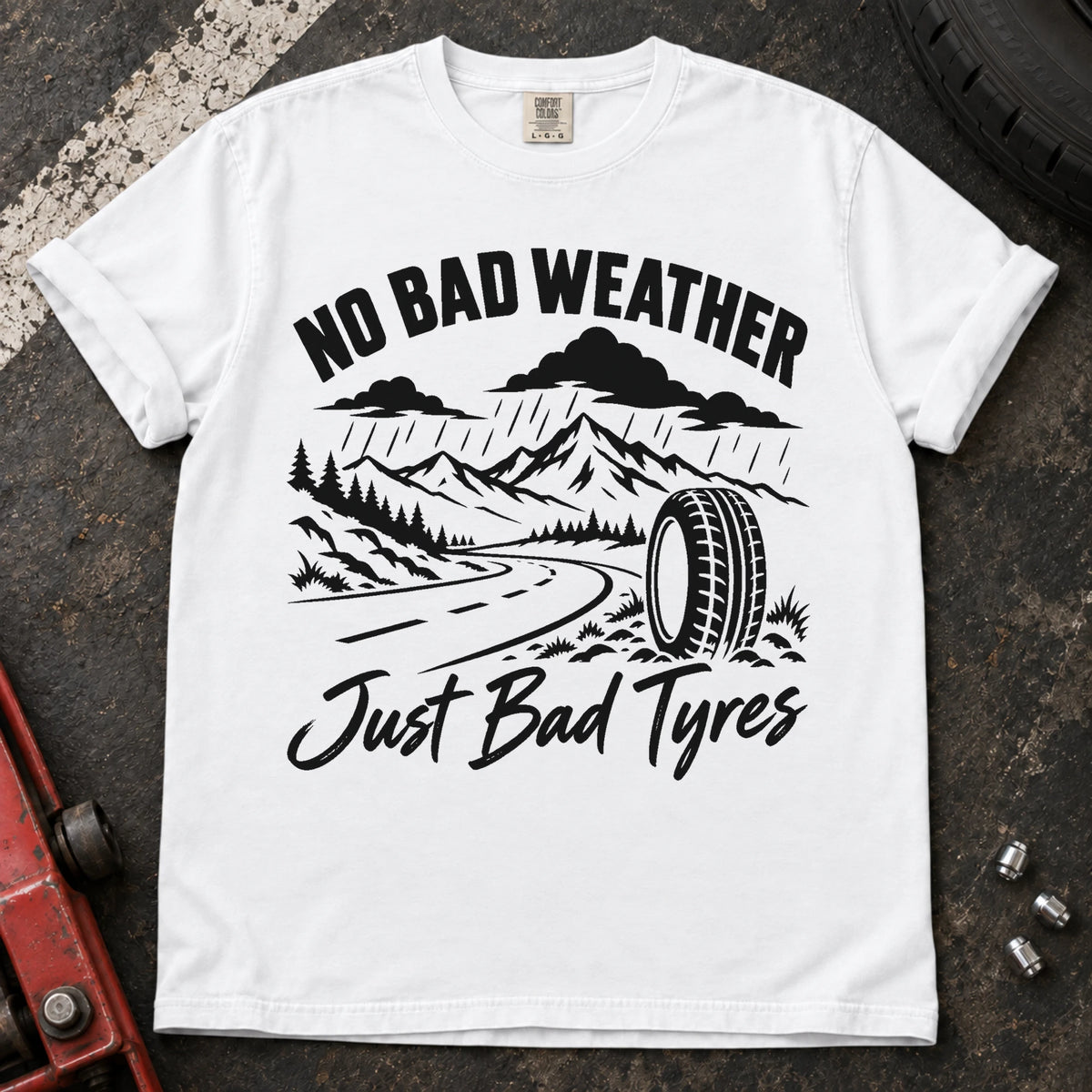 White car enthusiast T-shirt. A rainy mountain road and tire explain no bad weather, just bad tyres.