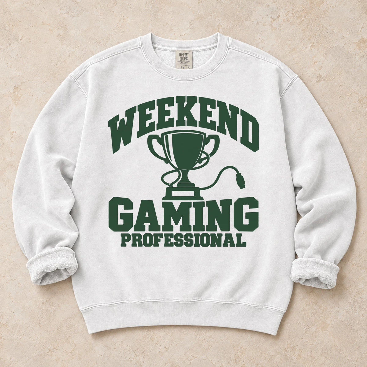White gaming sweatshirt. A trophy and gaming cable certify the weekend gaming professional.