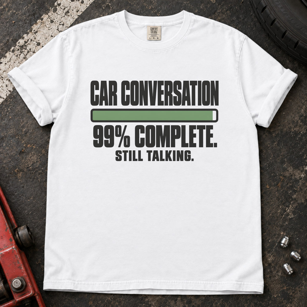White T-shirt showing a nearly full progress bar with 'Car conversation 99% complete. Still talking'.