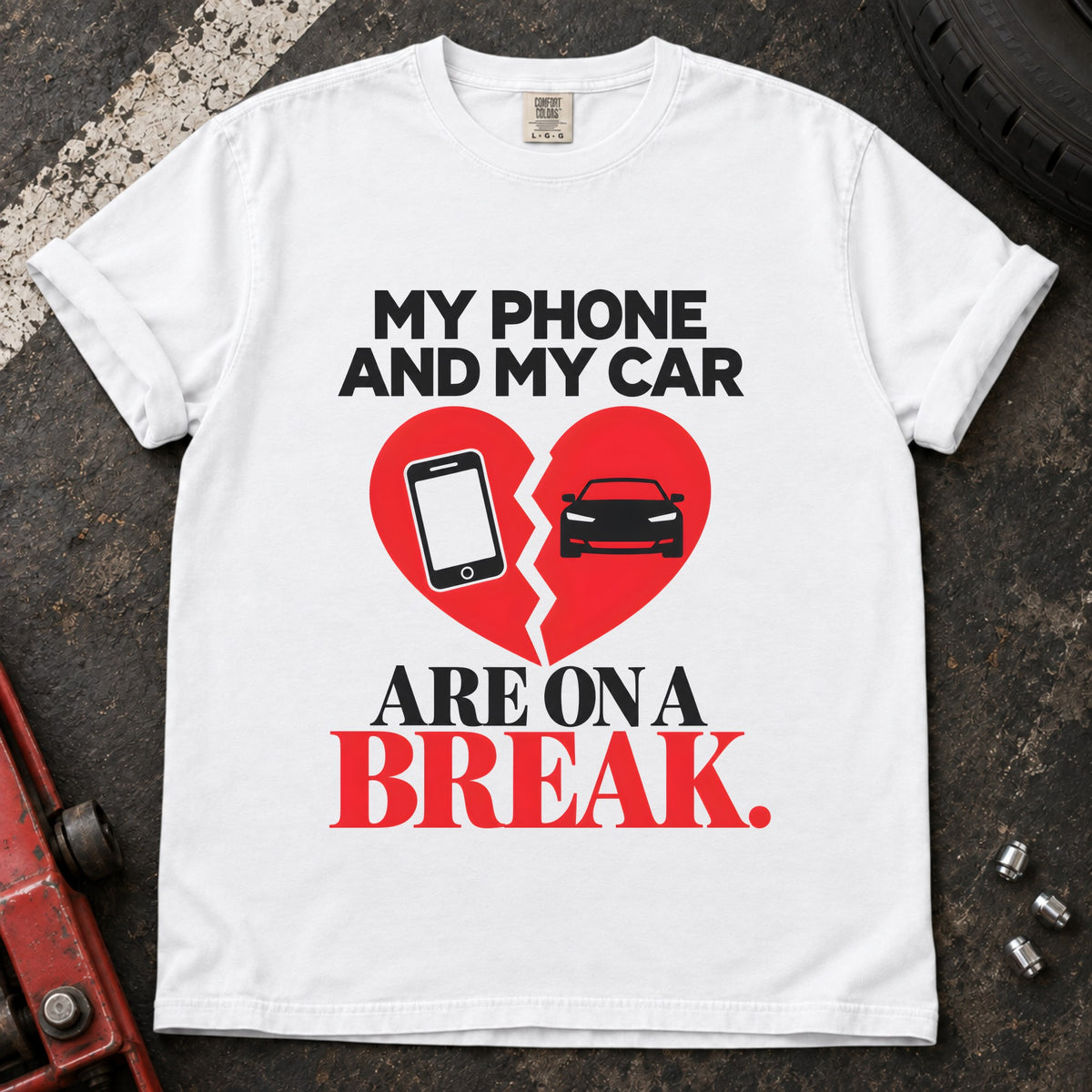 White T-shirt showing a phone and car on a broken heart with 'My phone and my car are on a break'.