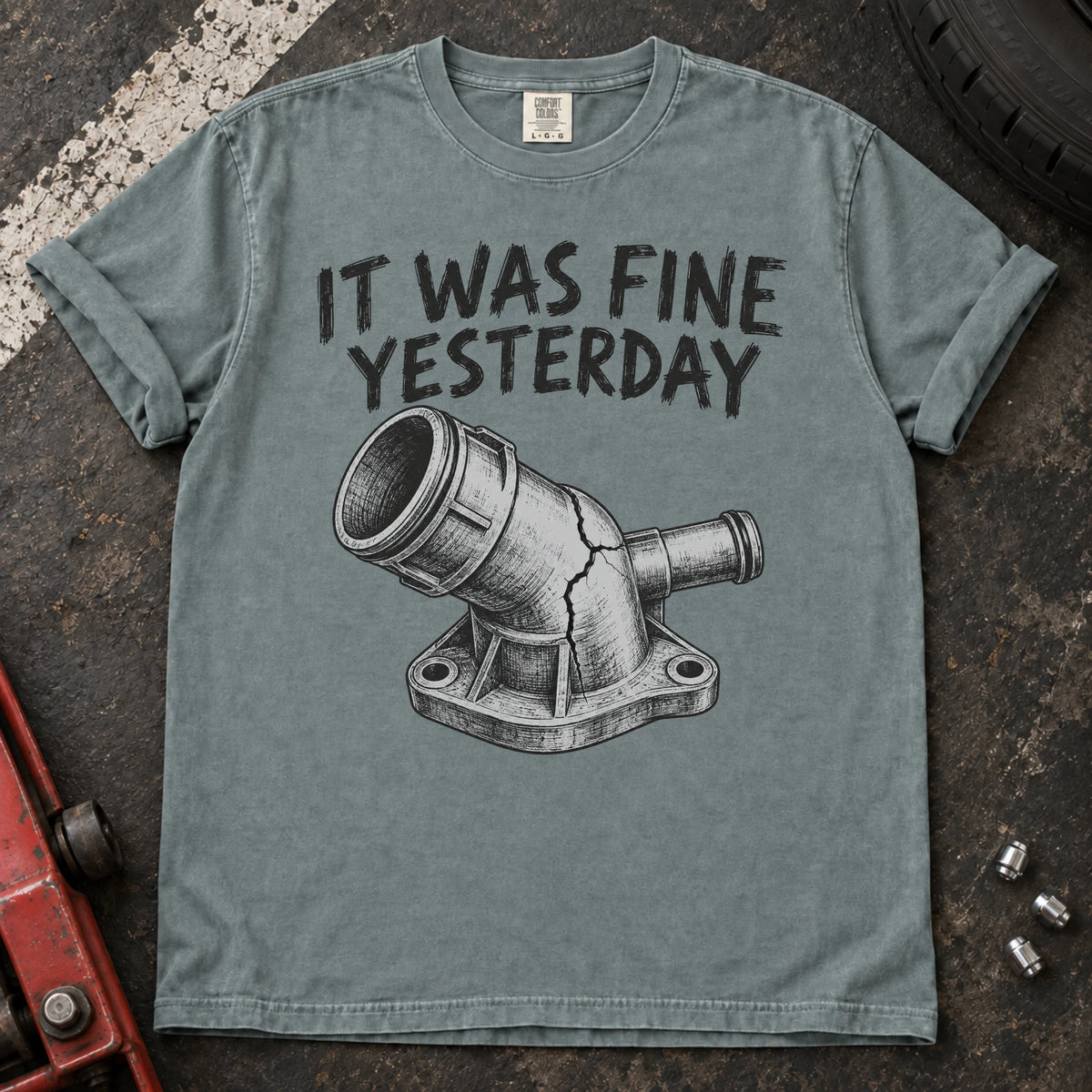 Bay car enthusiast T-shirt. A cracked coolant fitting proves it was fine yesterday.
