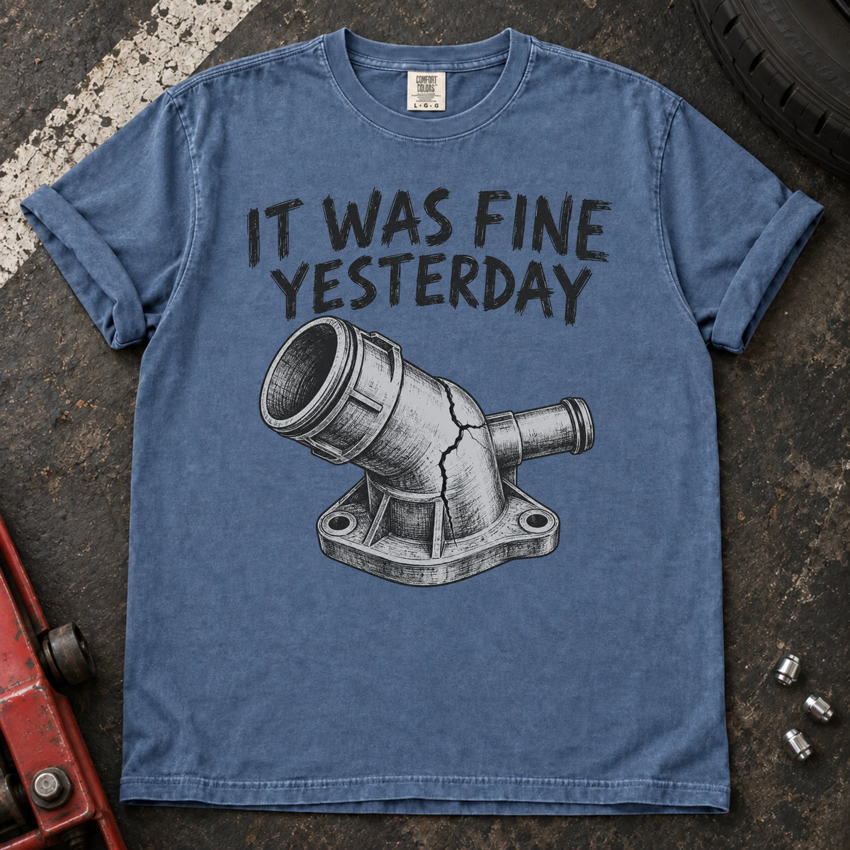 Blue Jean car enthusiast T-shirt. A cracked coolant fitting proves it was fine yesterday.
