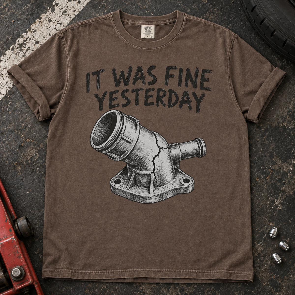 Espresso car enthusiast T-shirt. A cracked coolant fitting proves it was fine yesterday.