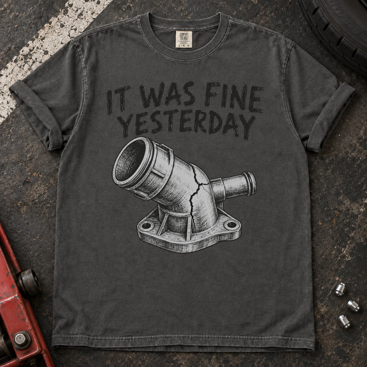 Pepper car enthusiast T-shirt. A cracked coolant fitting proves it was fine yesterday.